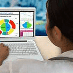 man looking at data charts on his laptop